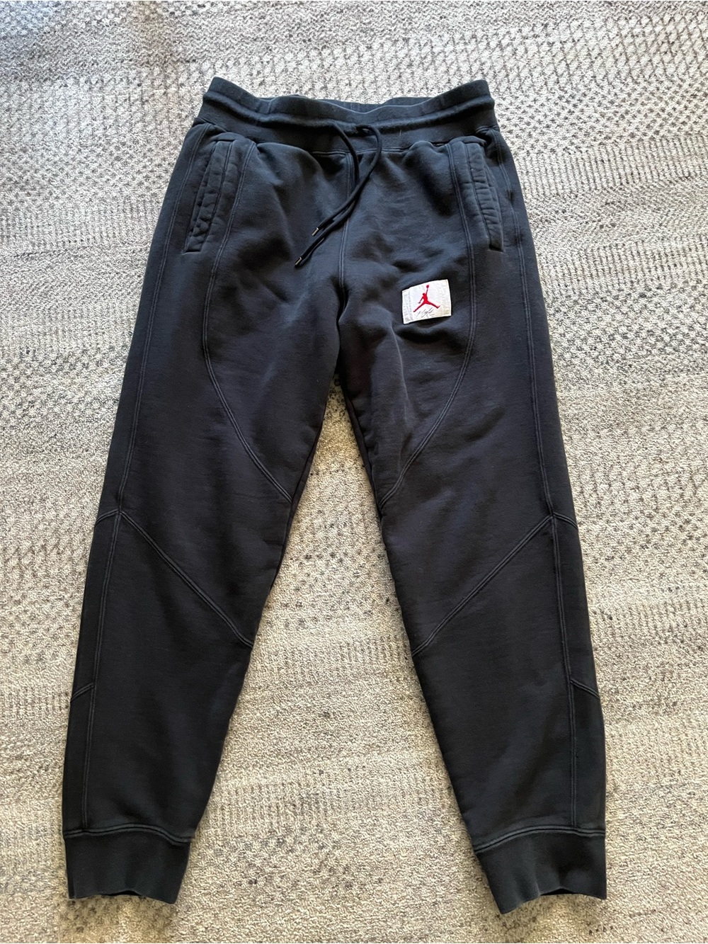 Air Jordan flight fleece pants, sweats joggers black with “flight” patch on leg